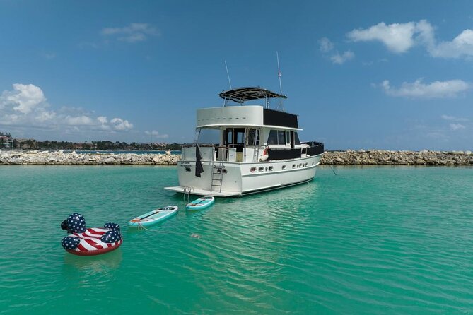 3 Hours - 53' Hatteras - Tulum, Playa Del Carmen, Riviera Maya - Stepping Onto a 58-Foot Hatteras, Built for Deck Time