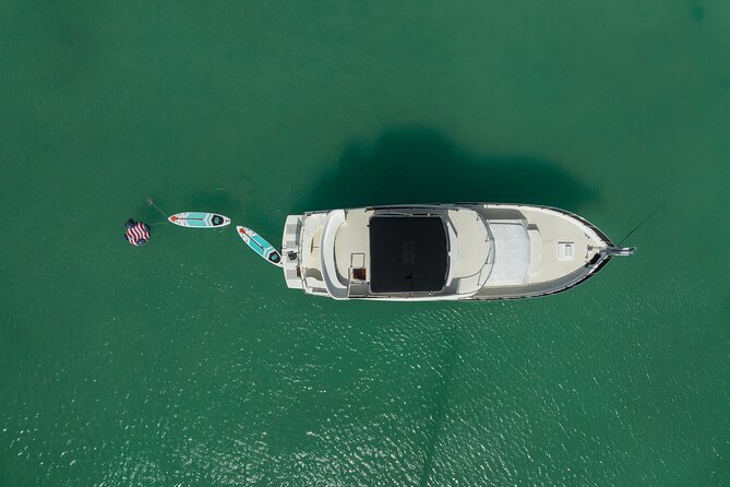 4 Hours - 53' Hatteras - Tulum, Playa Del Carmen, Riviera Maya - Paddleboards, pro help, and the onboard comfort factor