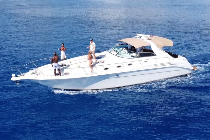 4 hours - Private 48ft Yacht all inclusive in Tulum and Playa del Carmen - Stop 1 at the reef: INAH snorkeling for 1 full hour