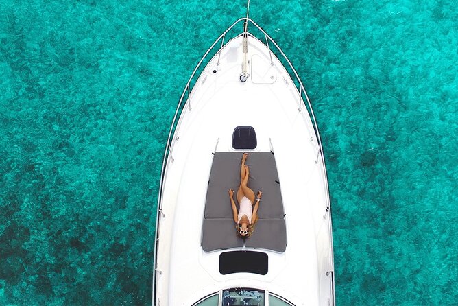 5-Hour Private 40' Yacht 2-Stop Tour to In-Ha reef with Food, Drinks & Snorkel - Stop Two at La Bocana: Shallow Water, Music, and Party-Mode Snorkeling