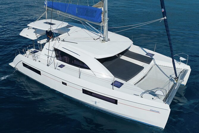 8-Hour Private 40' Cat 2 Stop to Cozumel, Food, Drinks & Snorkel - Setting Sail From Puerto Aventuras: Cruising Time and Troll Fishing