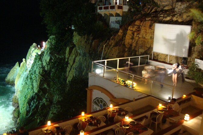 Acapulco Cliff Divers at Night - How the timing works: the 90-foot cliff jumps at La Quebrada