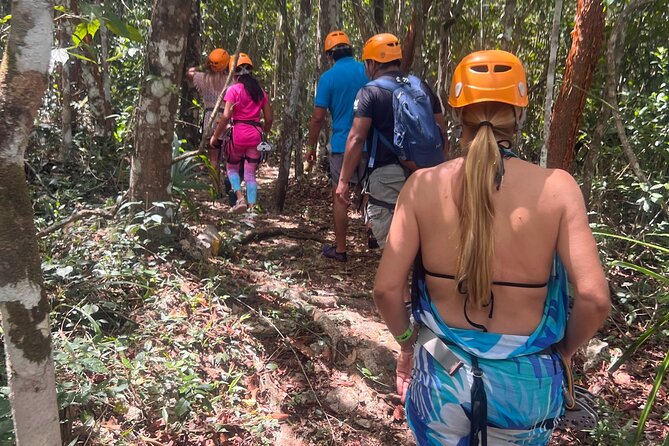 Adventure in a Private Mayan Community - Rappelling into the cenote and swimming: the cool payoff