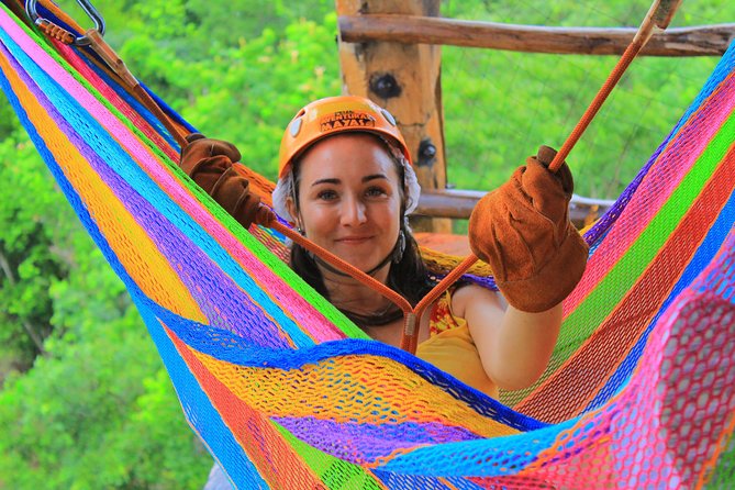 ATV Xtreme and Zipline Adventure from Riviera Maya - Zipline through the rainforest canopy to the cenote landing