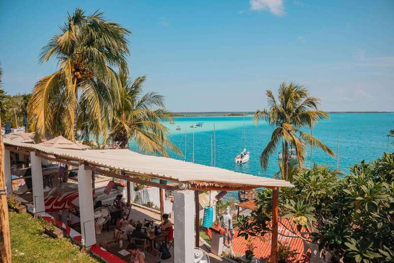 Bacalar: 3-hr Pontoon Boat Tour with Beach Club + Kayaks - Entering Bacalar Lagoon Comfortably, Not Rushed
