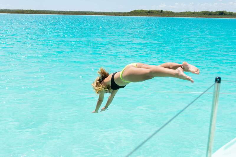 Bacalar: Group Sailing Trip with Swimming and Drinks - Sailing the lagoon on a small boat, not a floating classroom