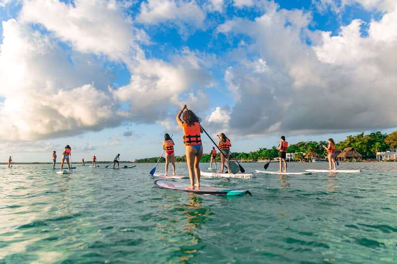 Bacalar: Sunrise Paddleboard Tour with Floating Picnic - Warm-up, safety briefing, then you’re off