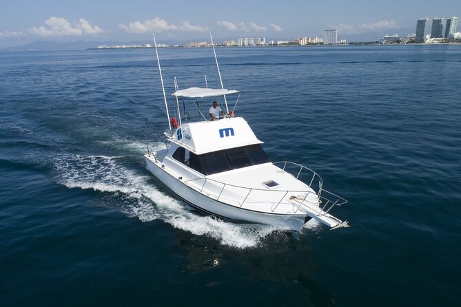 Bertram 38' Convertible Boat in Puerto & Nuevo Vallarta - Entering Banderas Bay: the shoreline sightseeing part