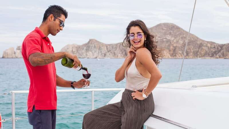 Cabo San Lucas: 2 Hour Sunset Cruise with Food and Wine - The route: photo stop, coastline views, then real sunset time