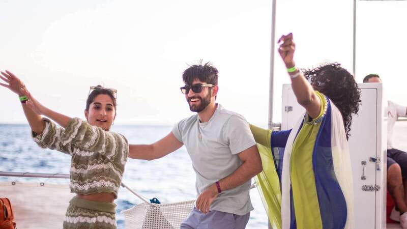 Cabo San Lucas: Sunset Party Cruise with Open Bar - Open bar and party music: what the vibe is really like