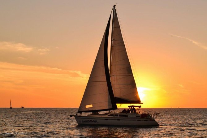 Cabo San Lucas Sunset Sailing Shared Cruise - Onboard vibe: snacks, unlimited drinks, and comfort basics