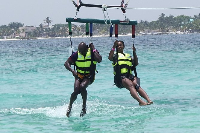Cancun Adventure: Reef Snorkeling & Parasailing Experience - Parasailing Over the Caribbean and Isla Mujeres: What the Ride Delivers