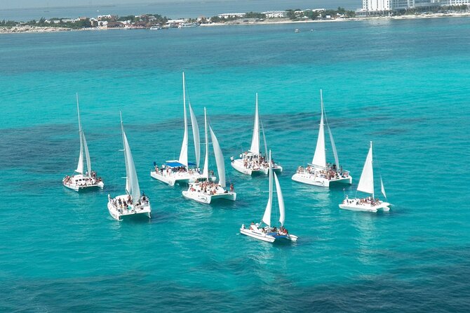 Cancun All Inclusive Catamaran Tour to Isla Mujeres - Beach club lunch and beach time: included food, included drinks, and beach reality