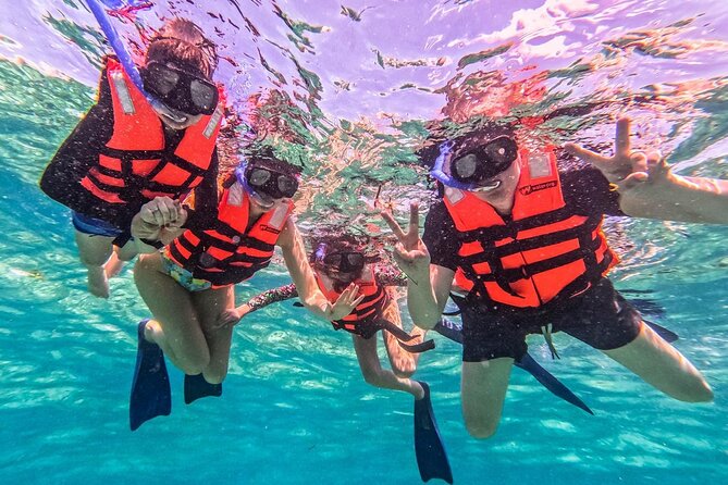 Cancun All Inclusive Catamaran Tour to Isla Mujeres - Isla Mujeres exploring: walking town versus golf cart routes