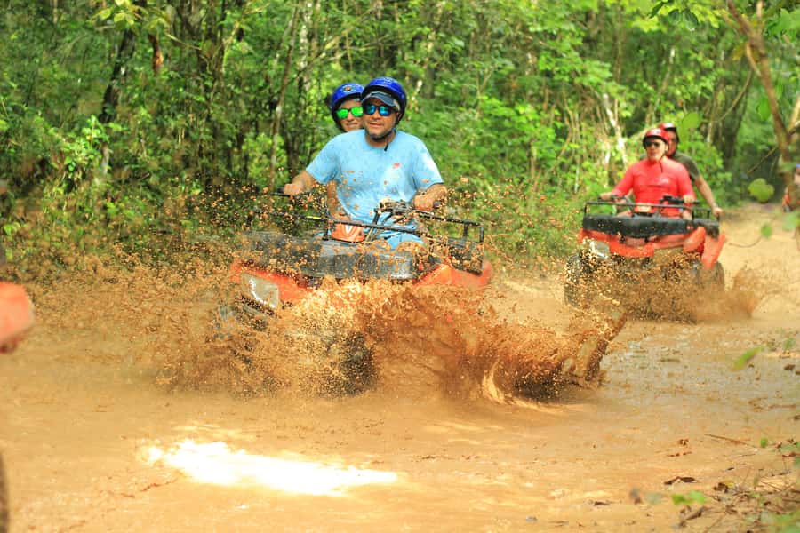 Cancún: ATV, Zipline, and Cenote Adventure with Lunch - Cenote swim in an artificial cenote: cool water, but come prepared