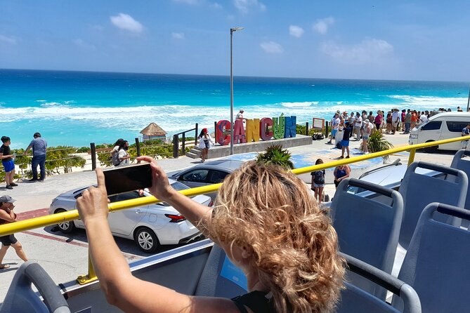 Cancun City Sightseeing and Shopping Tour on a Double Decker bus - A secret boardwalk moment: nice views, short stop