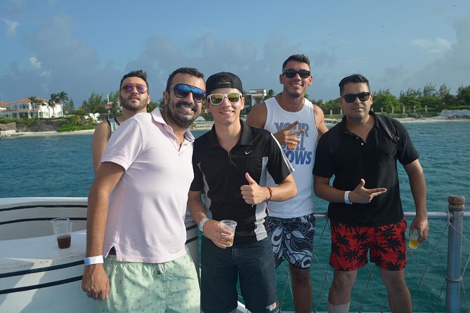Cancun Dancer Cruise to Isla Mujeres with Snorkeling and Lunch - Waterslide, deck entertainment, and salsa lessons on the ship