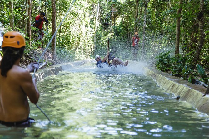 Cancun Extreme Zipline Canopy Tour - Army truck ride to the cenote area, then splash time
