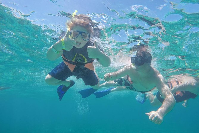 Cancun Half-Day Sailing Catamaran Cruise to Isla Mujeres - Snorkeling at El Meco Reef: Beginner Help, Real-World Conditions