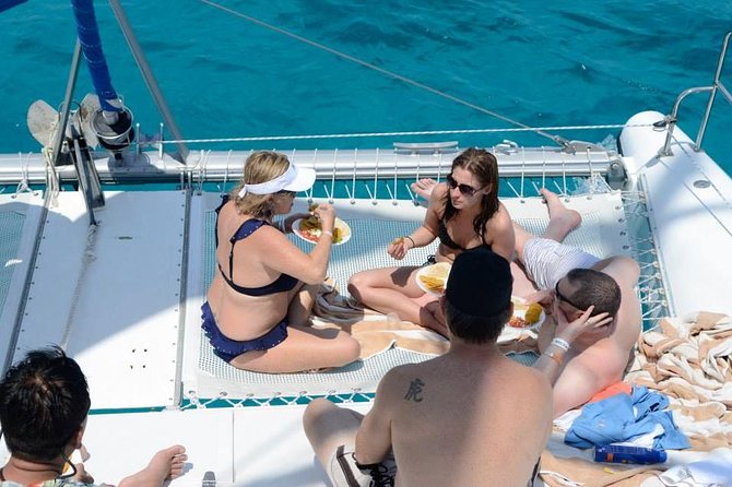 Cancun Half-Day Sailing Catamaran Cruise to Isla Mujeres - Food and Drinks on Board and at Isla Mujeres