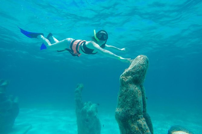 Cancun Half-Day Sailing Catamaran Cruise to Isla Mujeres - Where You Meet at Playa Langosta, and Why Timing Matters