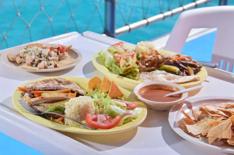 Cancun: Isla Mujeres Full Day Dancer Cruise - The 7-hour flow: breakfast, Meco reef snorkeling, then a swim you can control