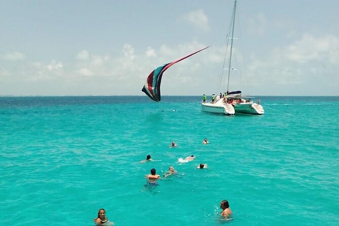 Cancun Sailing Catamaran Islas Mujeres With Luxury Beach Club - Drinks, music, and the open-bar strategy after you get wet