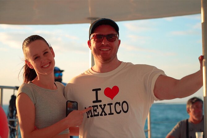 Catamaran Sunset Cruise to Isla Mujeres from Cancun - Drinks, live music, and the fun atmosphere onboard