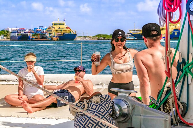Catamaran to Isla Mujeres Snorkeling Tour with Open Bar and Lunch - Price and dock fees: make your math feel fair