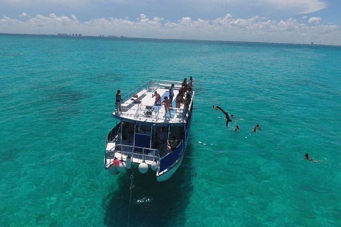 Catamaran Tour to Isla Mujeres all Included - Getting to the boat: meet at López Portillo 2, 85 at noon