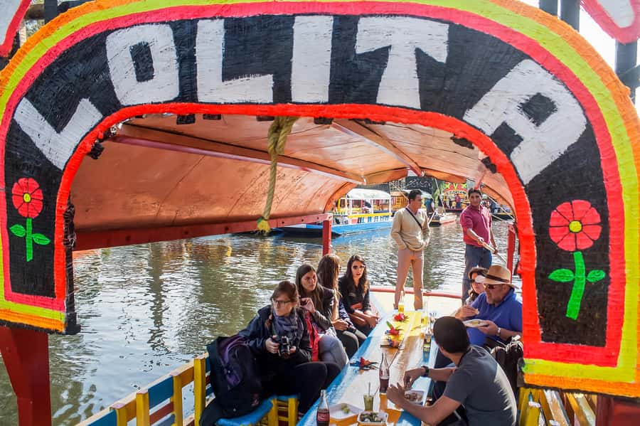 CDMX: Xochimilco, Coyoacan, Frida Kahlo Museum & Murals Tour - Xochimilco Late-Day Trajinera Ride: The Classic Canal Experience