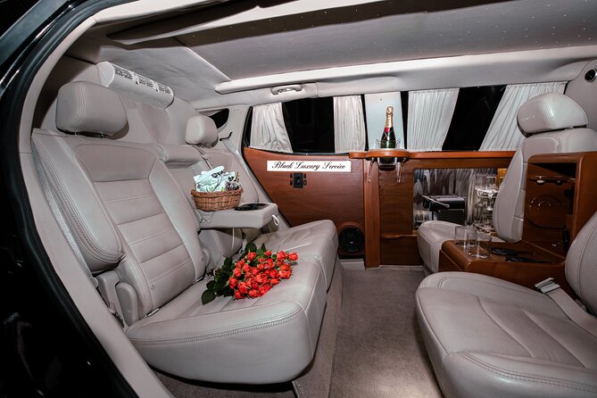 Deluxe GMC Limousine from CUN Airport to Cancun Hotel Zone - The included perks that actually help after a flight