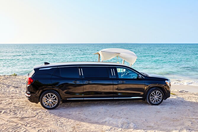 Deluxe GMC Limousine from CUN Airport to Playa Mujeres - CUN Airport meet-and-greet, tablets, and avoiding Cancun chaos