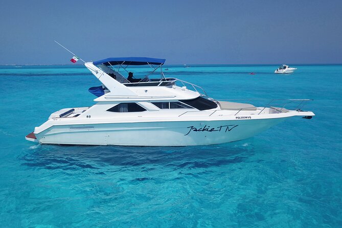 Deluxe Yacht 48FT with FlyBrige Rental in Cancun - Isla Mujeres stops: Playa Norte and Punta Sur, explained simply