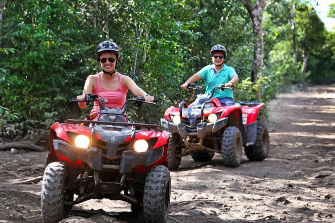 Drive an Atv shared, swim in a Cenote and ziplines in the Cancun - A three-in-one Cancun escape: ATV, zip lines, and a cenote swim