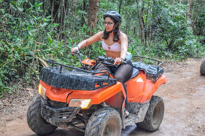 Drive an Atv shared, swim in a Cenote and ziplines in the Cancun - Zip lines: short but scenic, with a strict 130 kg limit