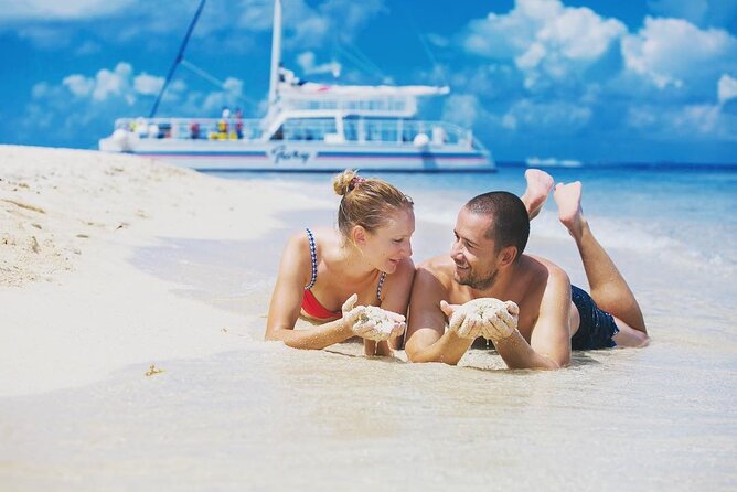 Exciting Catamaran Tour to Isla Mujeres, from Cancún! - Boarding day vibe: music, drinks, crowds, and crew energy