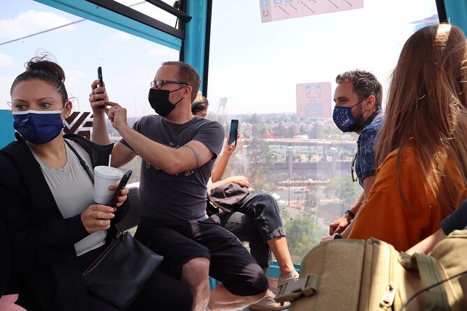 Fly over to the Unexplored Parts of CDMX by Cable Car - Where you meet at Churrería El Moro Centro and end at Pulquería La Risa