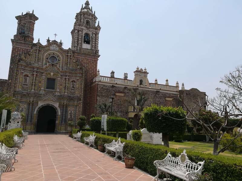 From Mexico City: Cholula Pyramid & Puebla Small Group Tour - Puebla de los Ángeles: volcano backdrop, cathedral geometry, and big bell towers