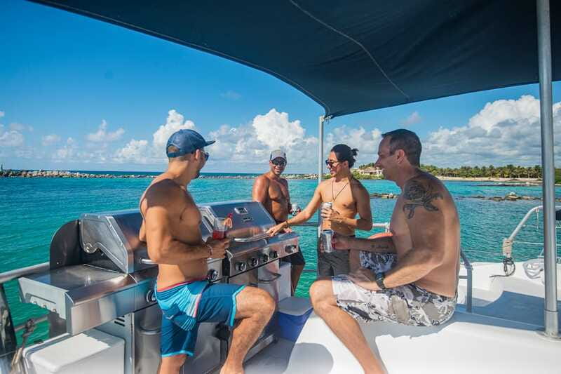From Puerto Aventuras: Share Catamaran Tour - The BBQ Lunch at Sea: Four Entrees, Open Bar, and What That Means
