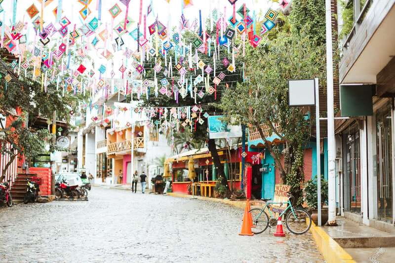 From Puerto Vallarta: San Pancho and Sayulita - San Pancho First: Huichol Crafts, Beaches, and a Short Clock