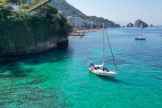 Full-Day Private Sailing Cruise Puerto Vallarta with Snorkeling - The boat and crew: sails, attention, and real-world sea conditions
