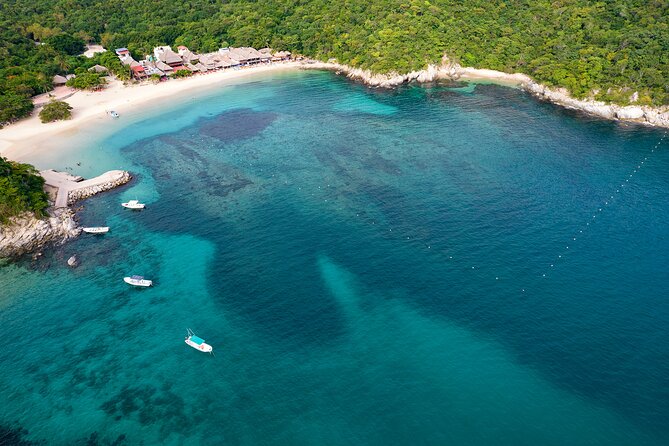 Full Day Tour of the Bays of Huatulco - Chachacual snorkeling: a protected beach day with guided gear use