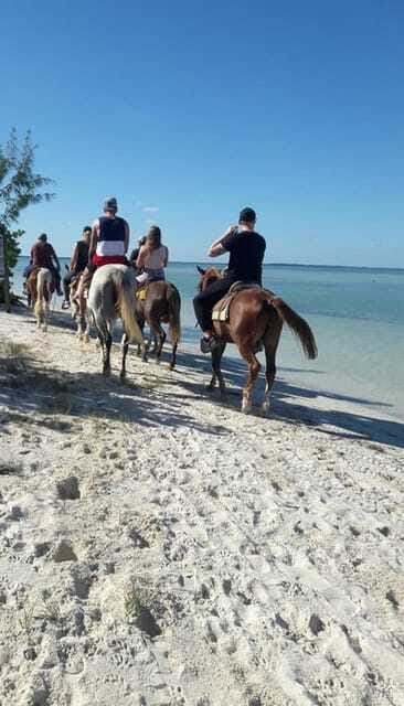 Group horseback ride on Holbox Island, Quintana Roo - Holbox bug tips: what to wear so the ride stays fun