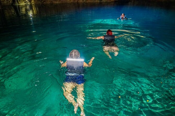 Half Day in Cancun Atvs Ziplines and Cenote Park - The cenote swim: cool down, and respect the cave vibe