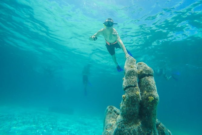 Half Day Sailing Private Catamaran to Isla Mujeres - Pickup, meeting details, and what to confirm before you go