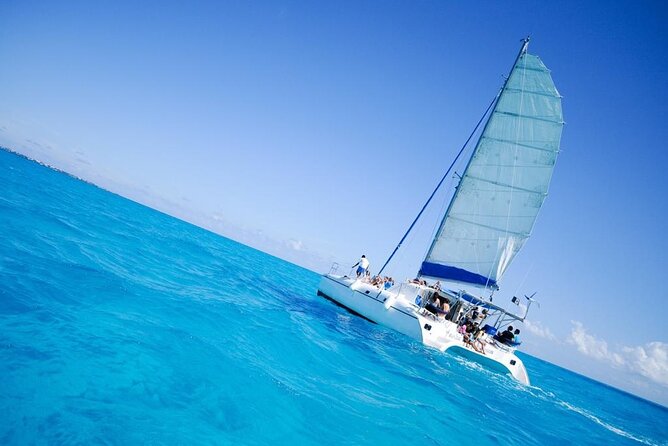 Half Day Sailing Private Catamaran to Isla Mujeres - The half-day route: snorkeling, reef looks, and then Isla Mujeres time