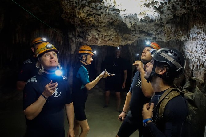 Hidden Cenote exploration in Playa del Carmen - The natural pool swim: clear water, speleothems, and snorkeling gear