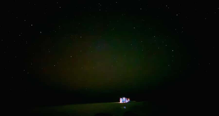 Holbox: Bioluminescence by Kayak and Stargazing. - Swimming where your body lights up: color changes and how to make it better