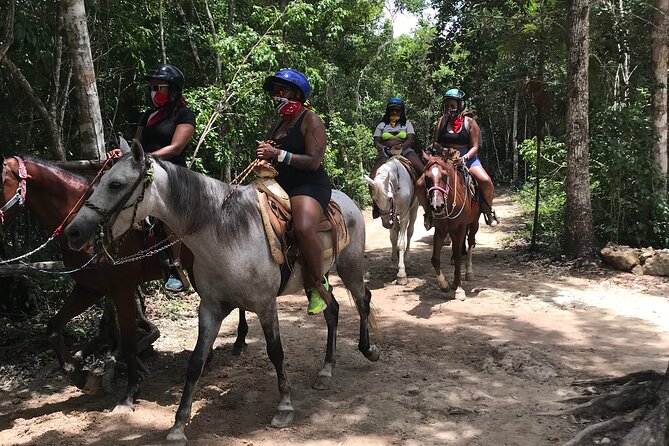 Horseback riding with ATV, zip lines and cenote, lunch and transfer - Zip lines first: safety gear, harness fit, and the nerves factor